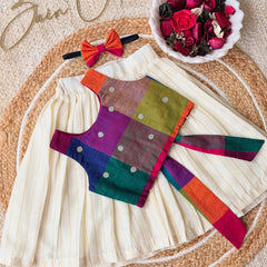 Celebrate Onam in style! 🪷 Vibrant Madras checks, subtle zari stripes, and traditional charm for kids.