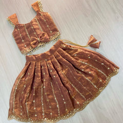 Designer Girls Metallic Rust Silk Lehenga Choli with Bow Accent & Pearl Lace Details