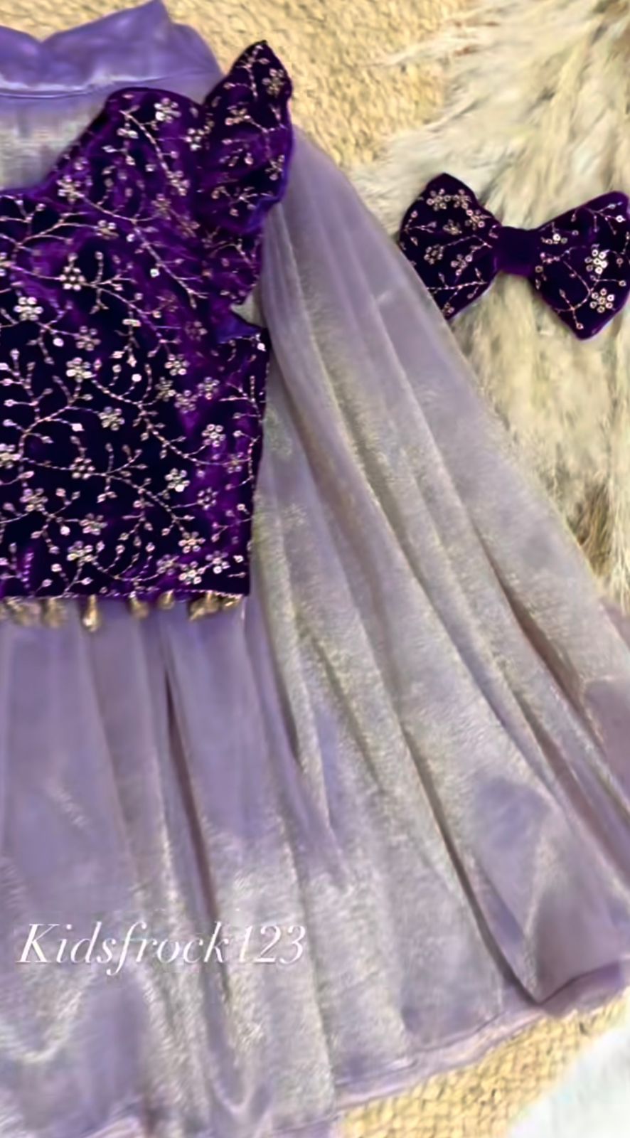 Festive Radiance: Girls' Purple Velvet Floral Sequinned Top & Lavender Twill Net Lehenga Set